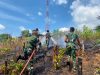 Gerak Cepat! Prajurit Brigif TP 85 Bersama Warga Berhasil Padamkan Karhutla di Kutai Barat.