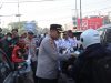 Kaporesta Samarinda, Kombespol Hendri Umar Bagikan Masker ke Pengendara di Kota samarinda
